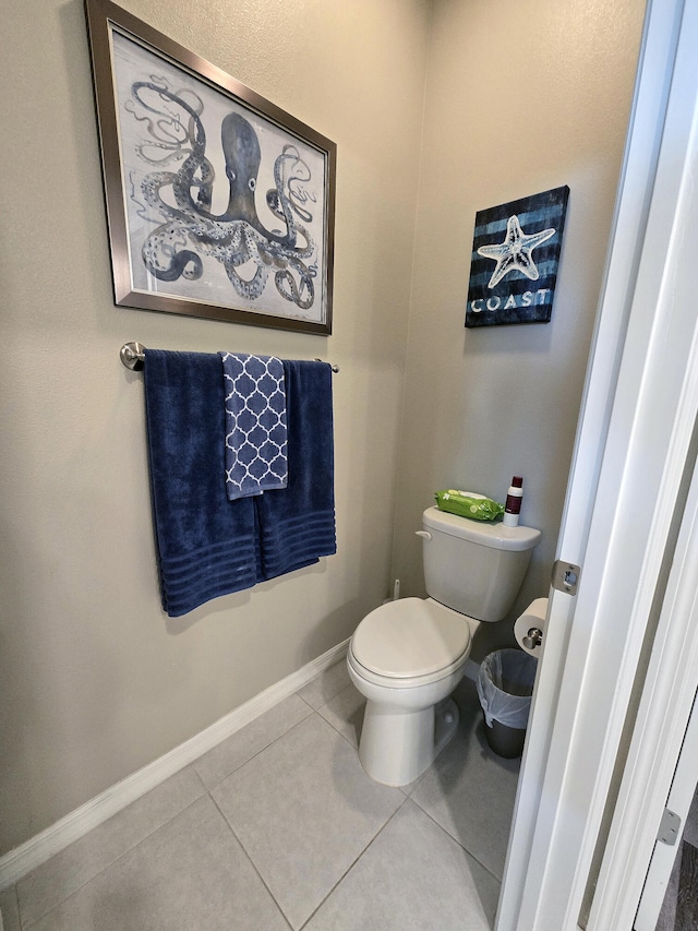 1892 SW Altman Ave, Port Saint Lucie, FL 34953 - bathroom featuring tile patterned flooring, baseboards, and toilet