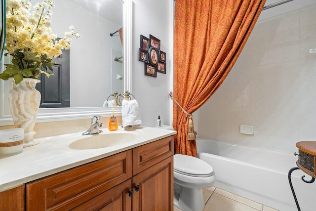 full bathroom with shower / bath combination with curtain, vanity, toilet, and tile patterned floors