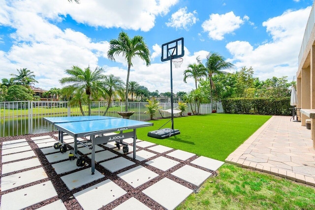 view of patio featuring a water view