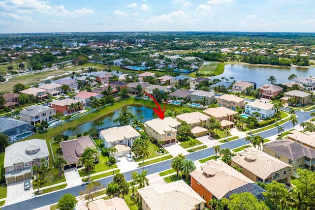 bird's eye view with a water view