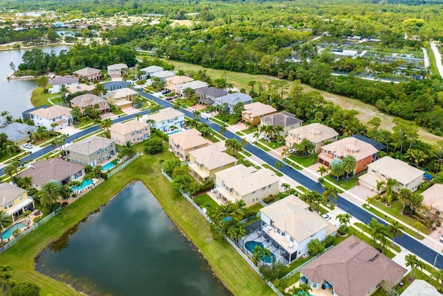 drone / aerial view with a water view