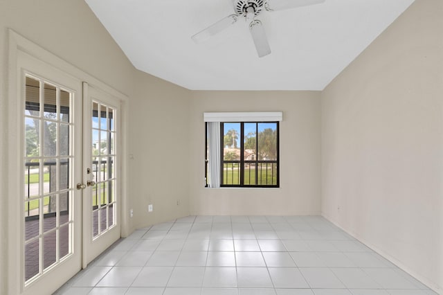 unfurnished room with ceiling fan, french doors, and a healthy amount of sunlight