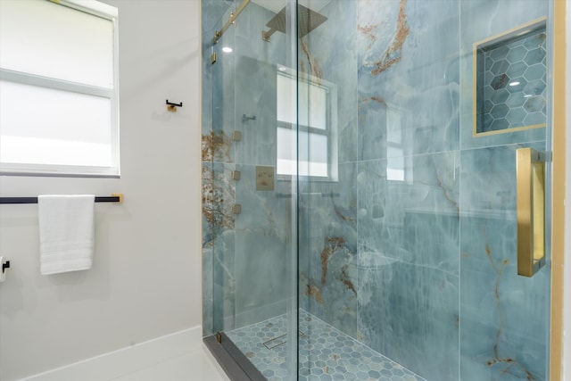 bathroom with an enclosed shower