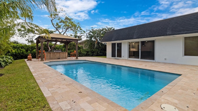 view of pool featuring a gazebo and a bar