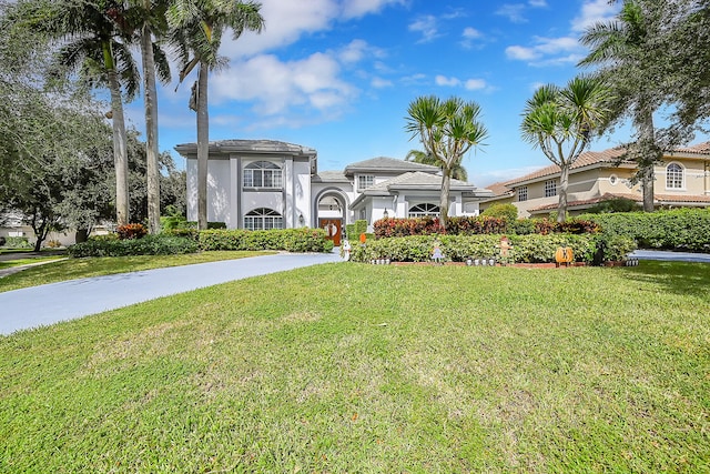 view of front of house with a front lawn