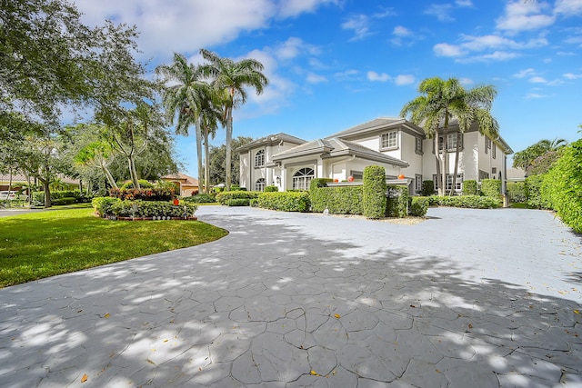 view of front of home with a front lawn