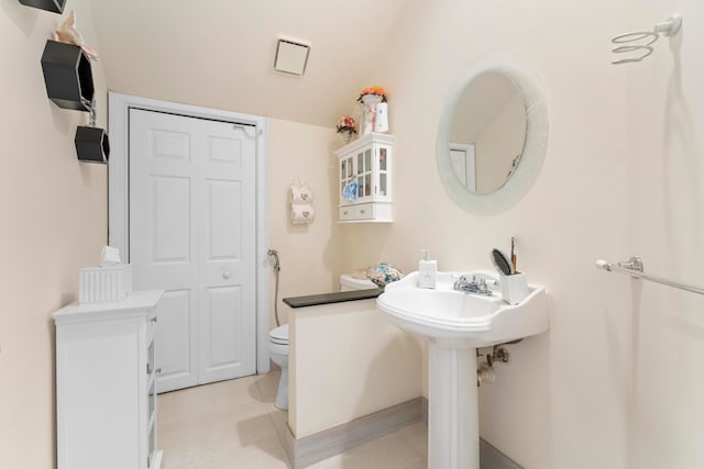 bathroom featuring toilet