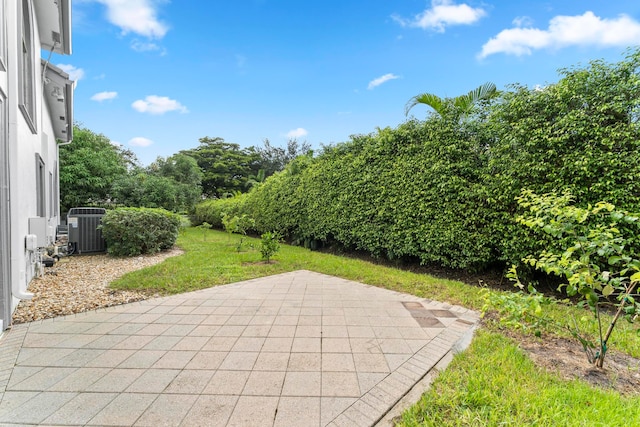 view of patio with central AC