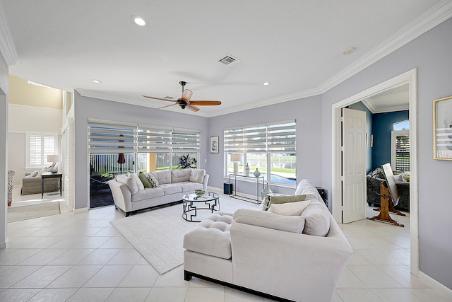 tiled living room with crown molding and ceiling fan