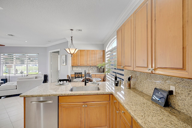 kitchen featuring ornamental molding, sink, decorative backsplash, and a healthy amount of sunlight