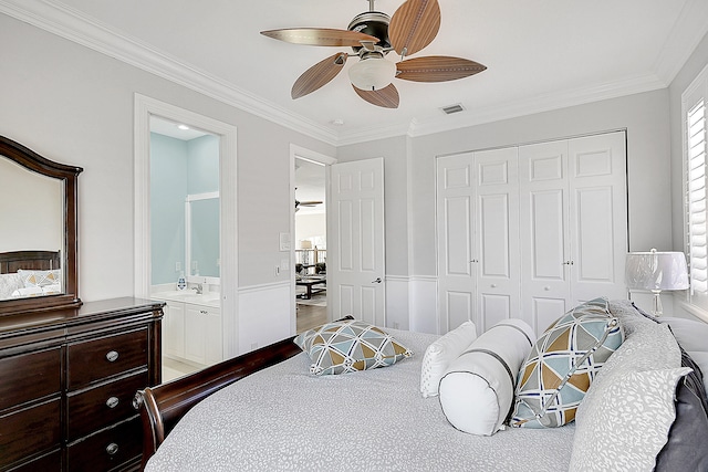 bedroom with a closet, ceiling fan, crown molding, and wood-type flooring