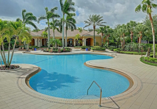 view of pool featuring a patio area