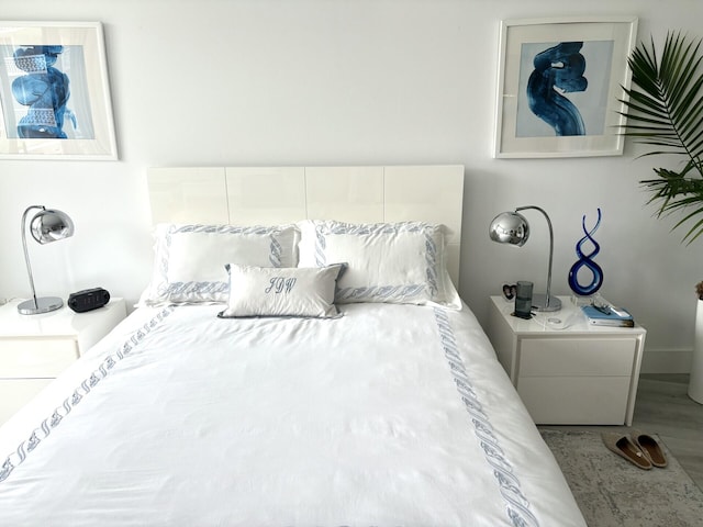 bedroom featuring hardwood / wood-style floors