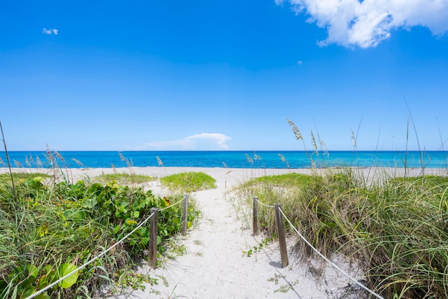 property view of water featuring a view of the beach