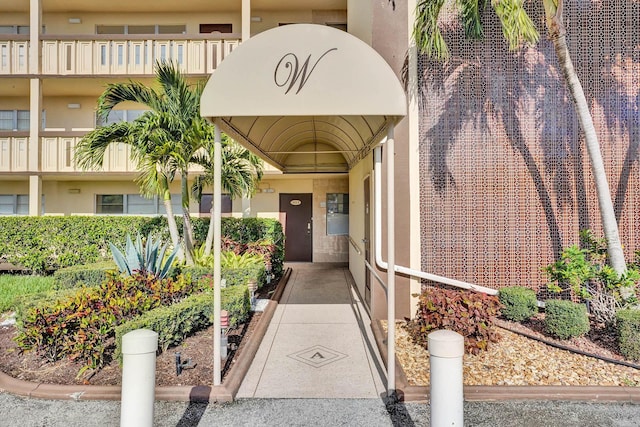 doorway to property with a balcony