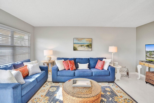 living room with a textured ceiling