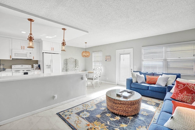 tiled living room with a textured ceiling