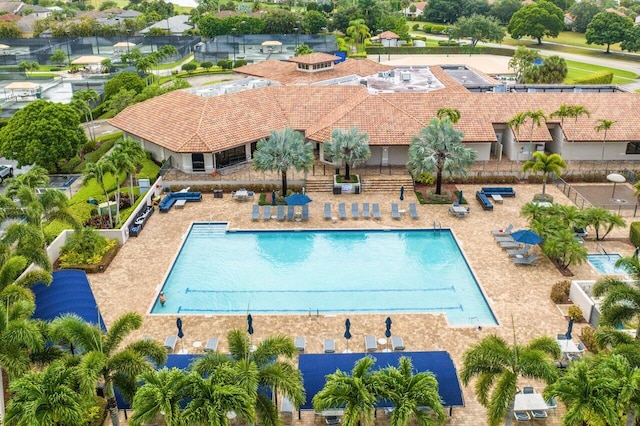 view of swimming pool featuring a patio area