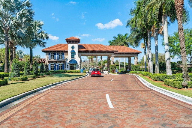 view of home's community with a lawn