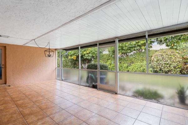 view of unfurnished sunroom