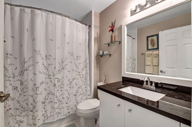 bathroom featuring vanity, tile patterned flooring, toilet, and a shower with shower curtain