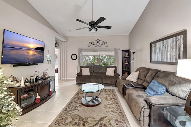 tiled living room with ceiling fan and vaulted ceiling