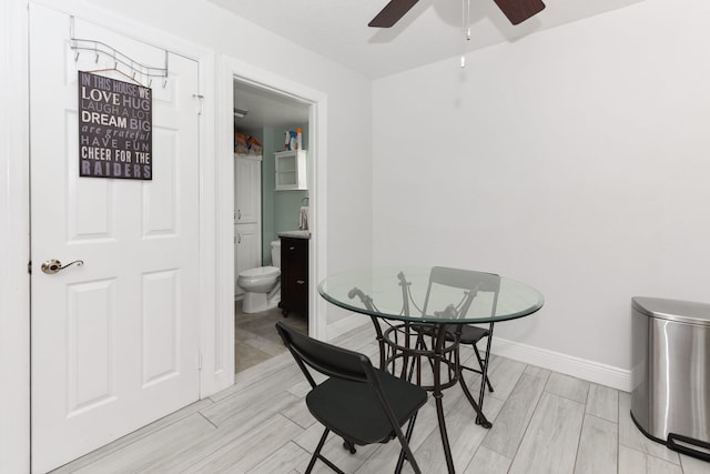 dining area featuring light hardwood / wood-style floors and ceiling fan