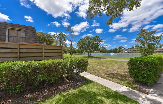 view of yard with a water view