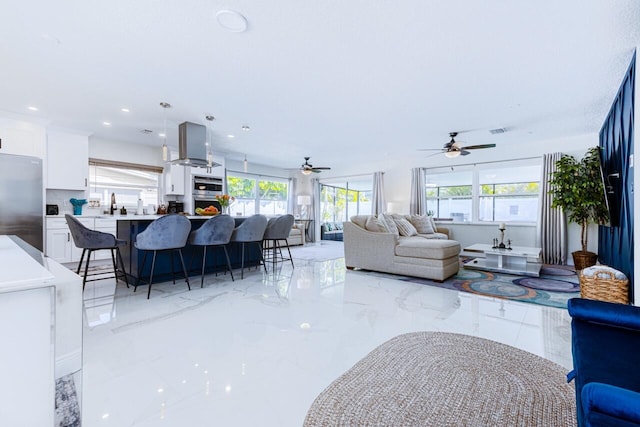 living room featuring ceiling fan