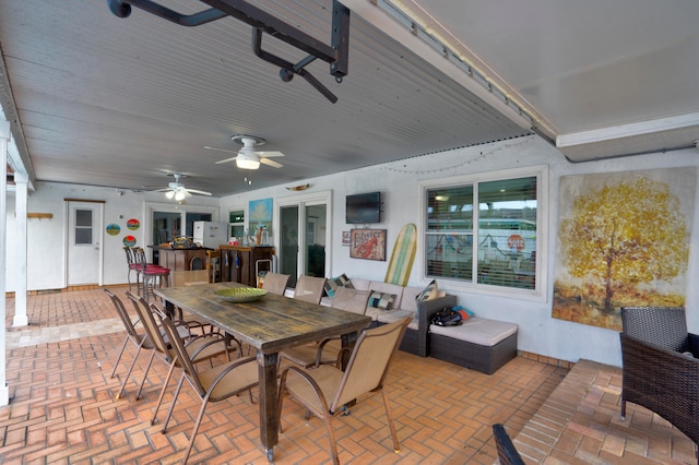 view of patio featuring ceiling fan