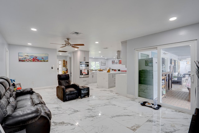 living room with ceiling fan