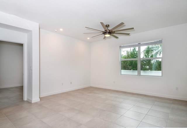 unfurnished room featuring ceiling fan