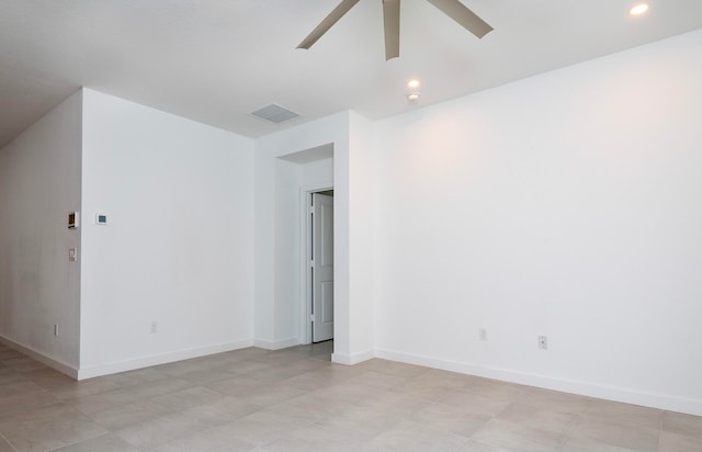 spare room with ceiling fan