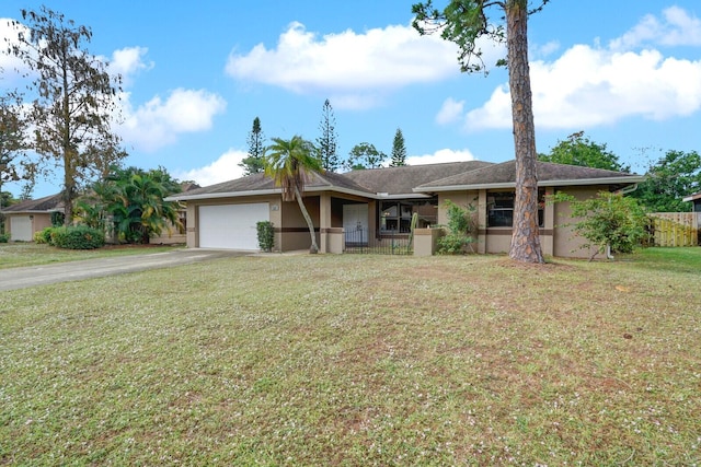 ranch-style house featuring a garage and a front lawn