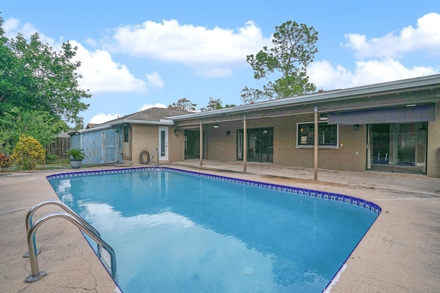 view of pool with a patio