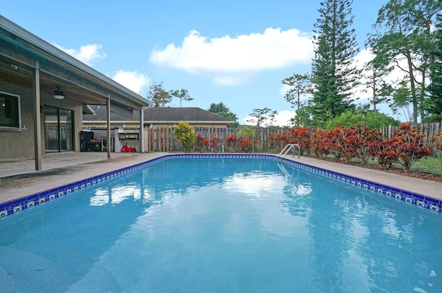 view of pool featuring a patio