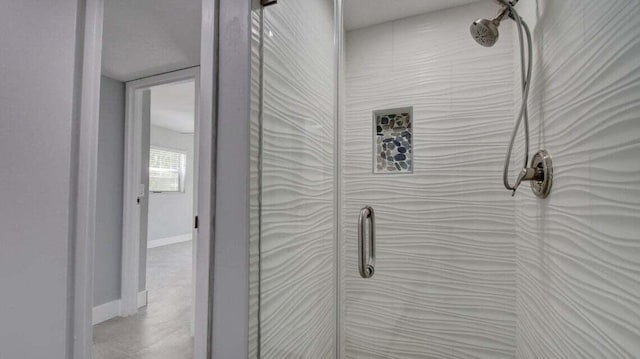 632 Monaco N, Delray Beach, FL 33446 - detailed view of a tile shower and baseboards