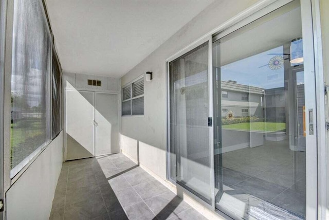 632 Monaco N, Delray Beach, FL 33446 - unfurnished sunroom with ceiling fan