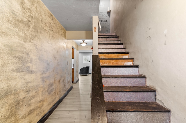 stairs with hardwood / wood-style flooring