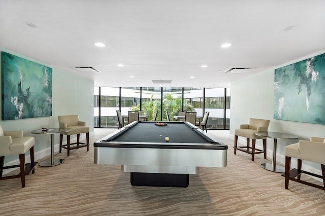 recreation room with pool table, a wall of windows, light carpet, and plenty of natural light