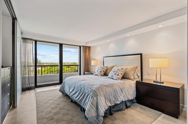 bedroom featuring access to outside and light tile patterned floors