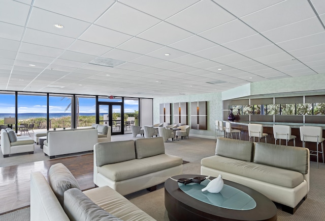 living room with a mountain view and floor to ceiling windows