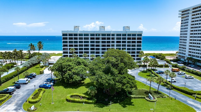 birds eye view of property with a water view