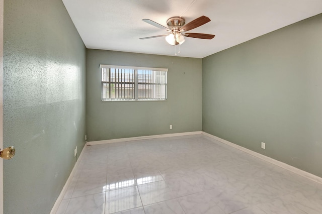 empty room featuring ceiling fan