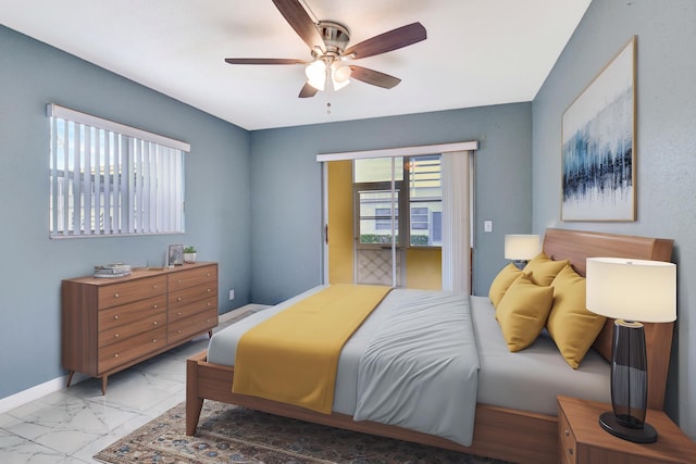 bedroom featuring ceiling fan and access to exterior