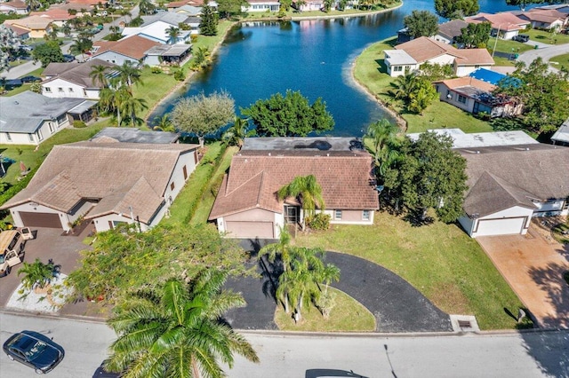 drone / aerial view with a water view