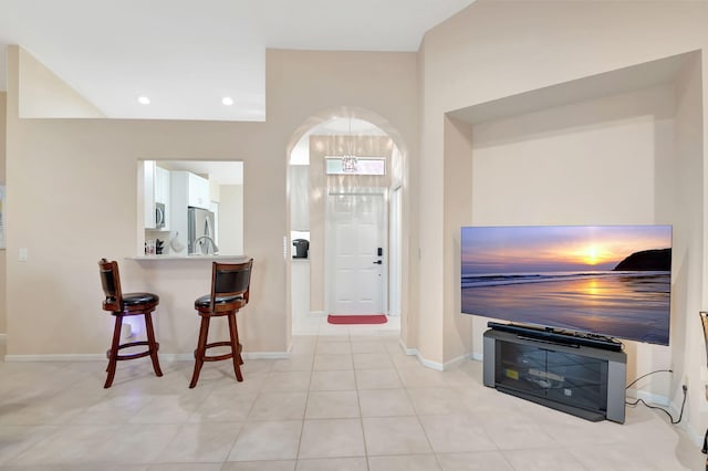 entrance foyer with light tile patterned floors