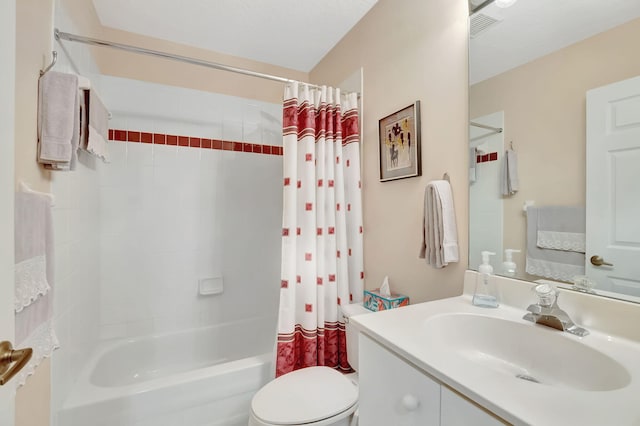 full bathroom featuring vanity, shower / tub combo, and toilet