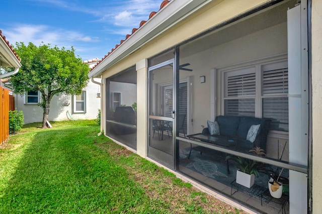 view of yard featuring a sunroom