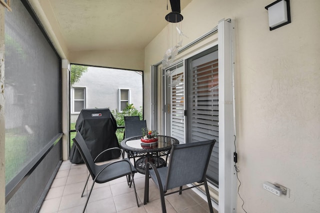 sunroom / solarium with lofted ceiling